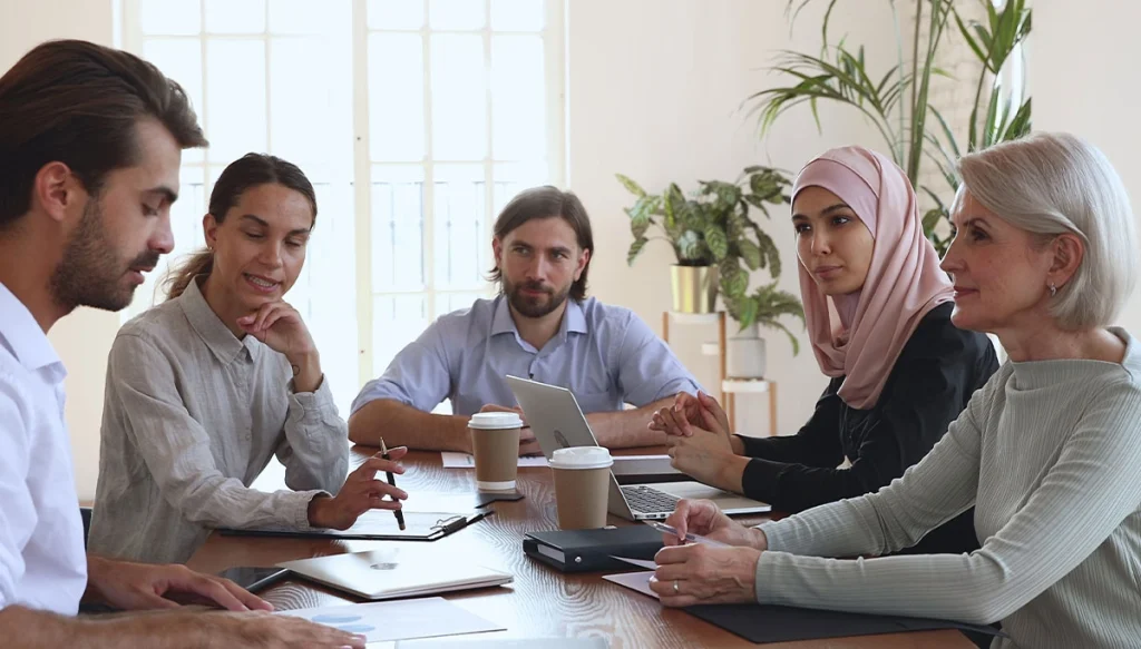 Adults having a conversation at a table