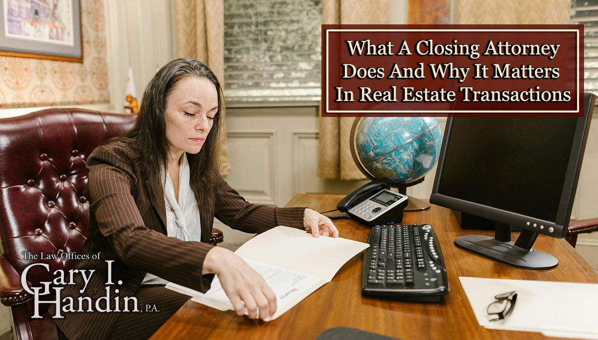 female attorney looking at paperwork on her desk