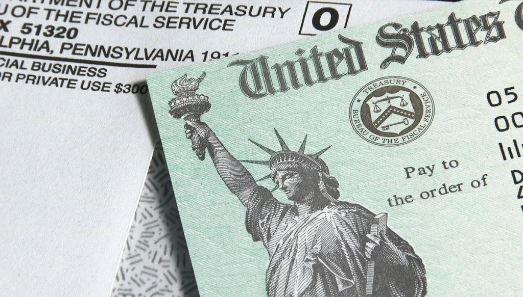 tax document and a tax check laid untop of each other